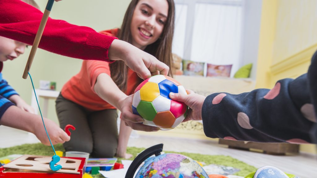 woman-kids-playing-floor